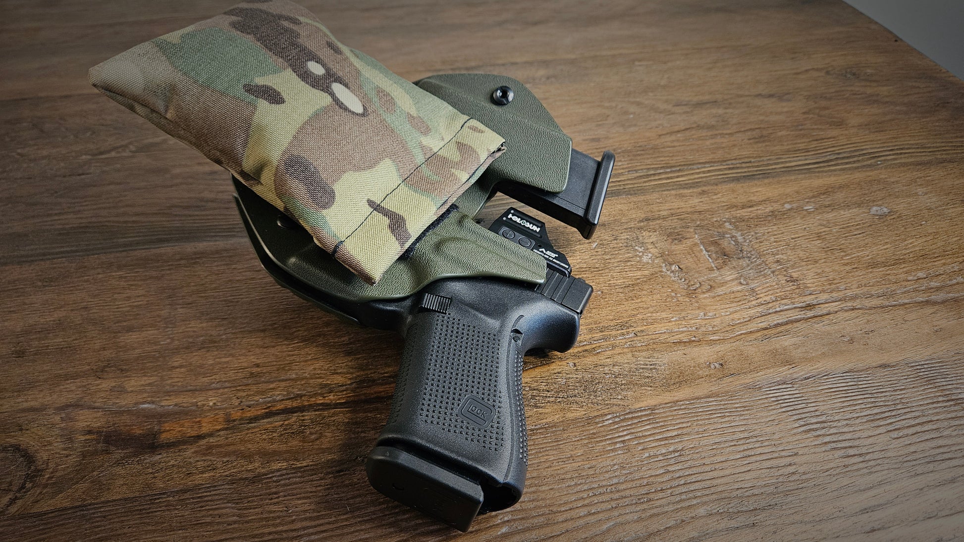 Original MultiCam Stallster holster pillow attached to a sidecar LLOD (Last Line of Defense) holster, carrying a Glock 19 and extra mag