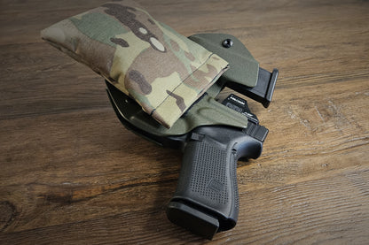 Original MultiCam Stallster holster pillow attached to the back of a LLOD (Last Line of Defense) holster, carrying a Glock 19